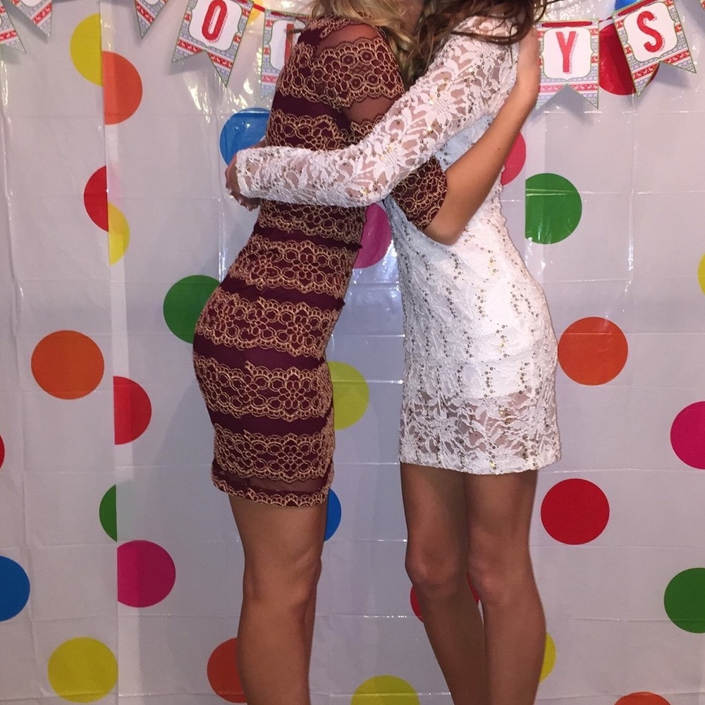 Maroon and gold tight-fitting dress.